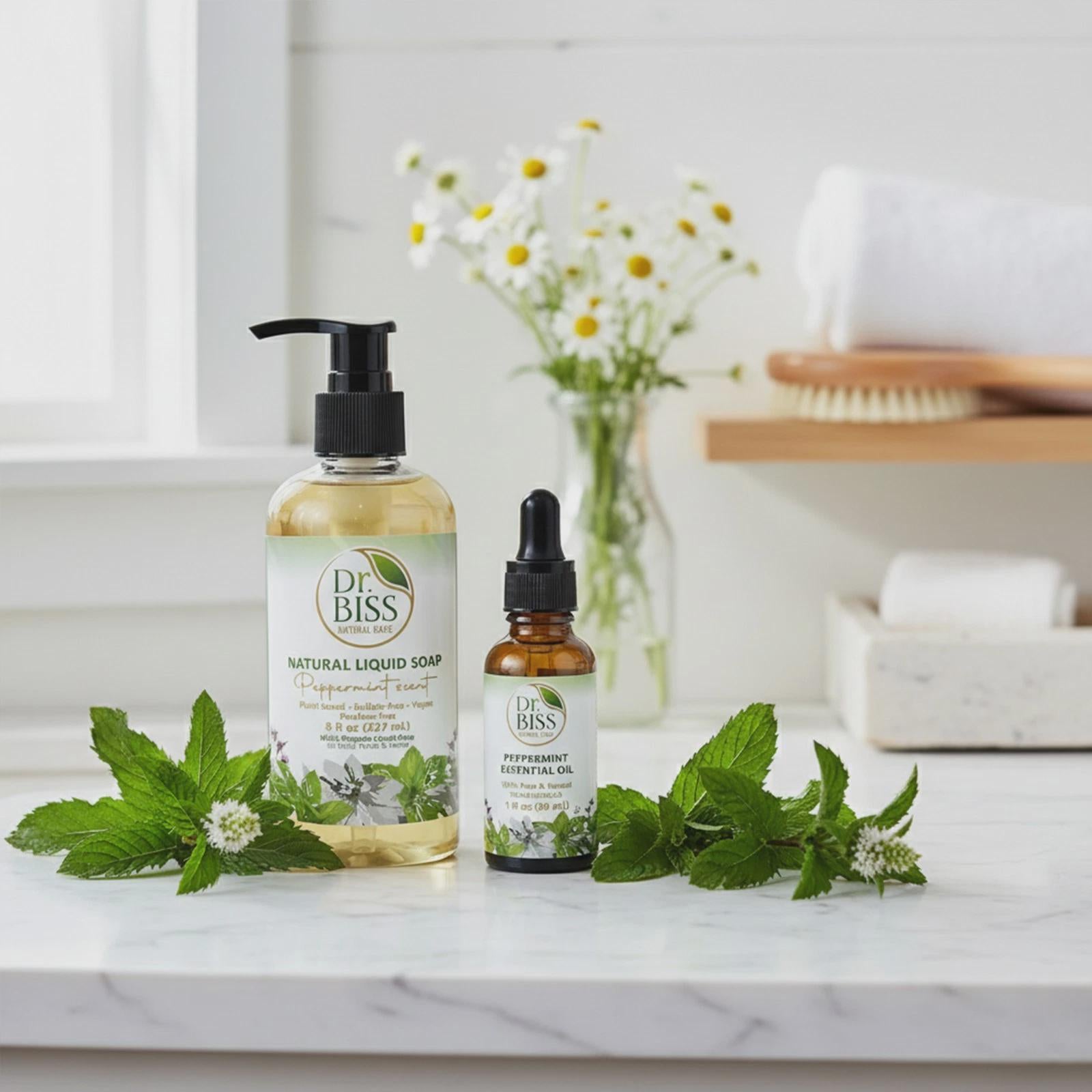 Peppermint liquid soap bottle with natural mint leaves on clean bathroom counter
